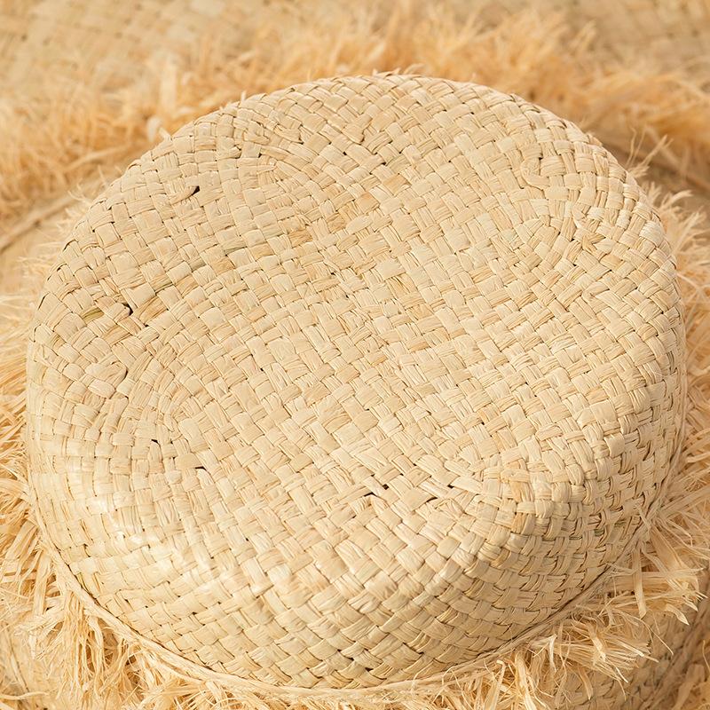 European and American style straw woven fringed decorative hand woven big eaves flat top Lafite straw hat sunscreen sunshade beach burr straw hat