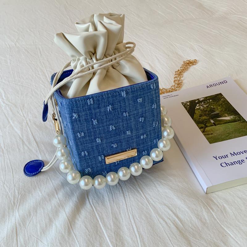 New niche bucket bag trendy personalized high-end messenger bag simple atmosphere pearl portable women's bag