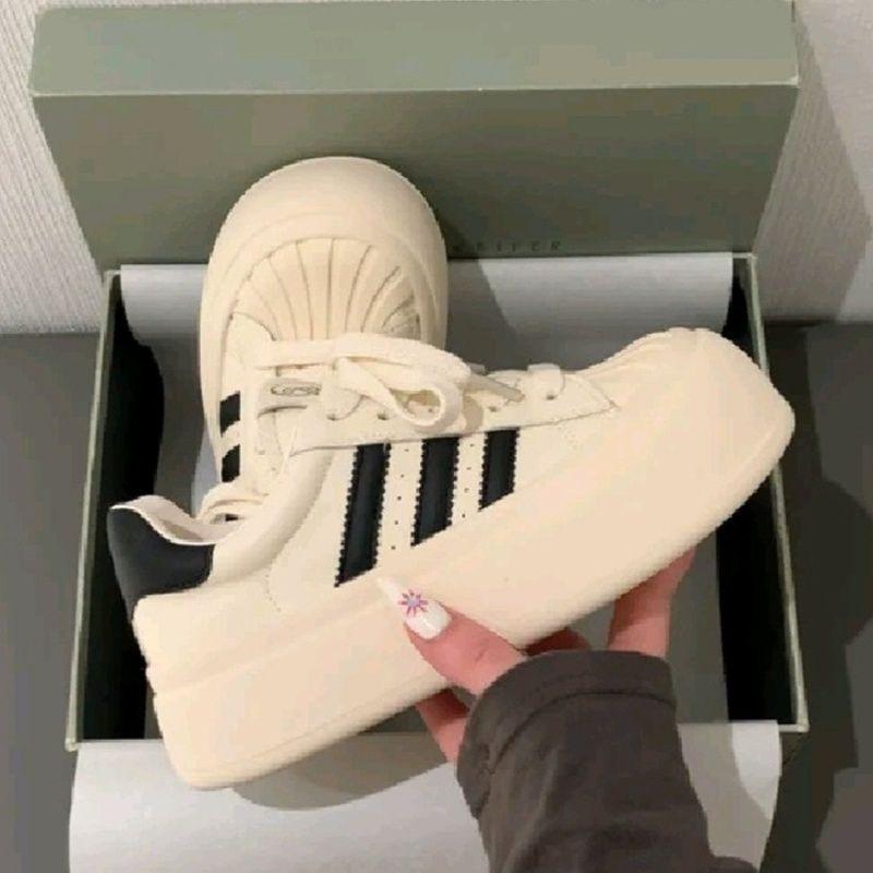 Niche shell head black board shoes women's spring new platform leisure sports big head doll shoes high value