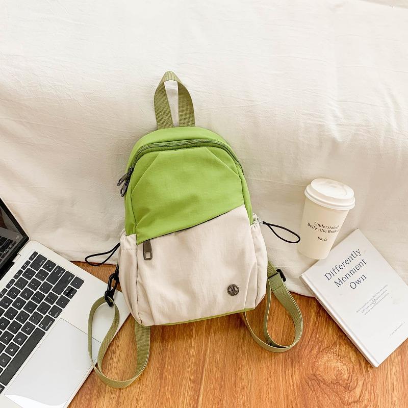 Niche design contrasting color backpack women's new lightweight fashion student bag multifunctional backpack breast bag
