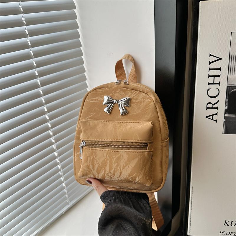 Schoolbag Bow Backpack Women's Niche Design Fashion Korean Edition School Bag 1011 Autumn and Winter Lightweight Small Travel Backpack