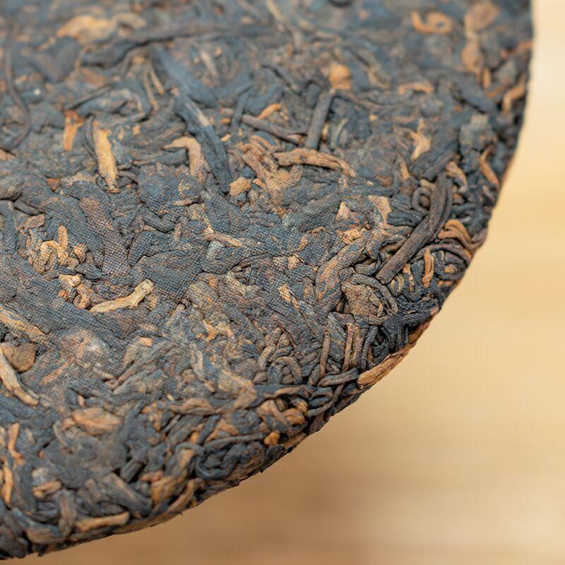 Mansong Pu 'er Te 357g tekake produsenter direktesalg av Yunnan gammelt tre moden Pu 'er te