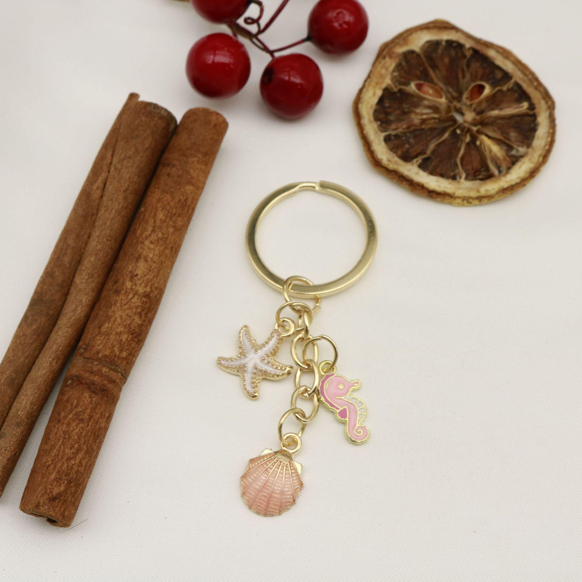 Creative Starfish & Shell Drip Oil Alloy Keychain with Pearl Pendant for Bags