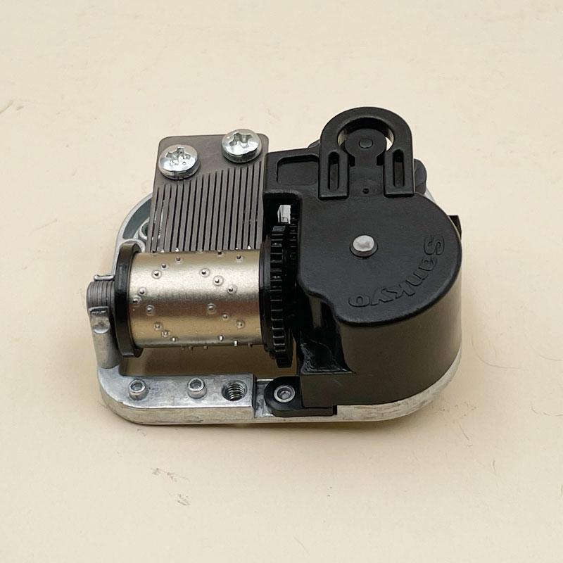 Boutique Antiques Gifts Sankyo Silver Wind Up Rotating Musical Clock Movement Music Box Mechanism  18 Note for DIY Music Box
