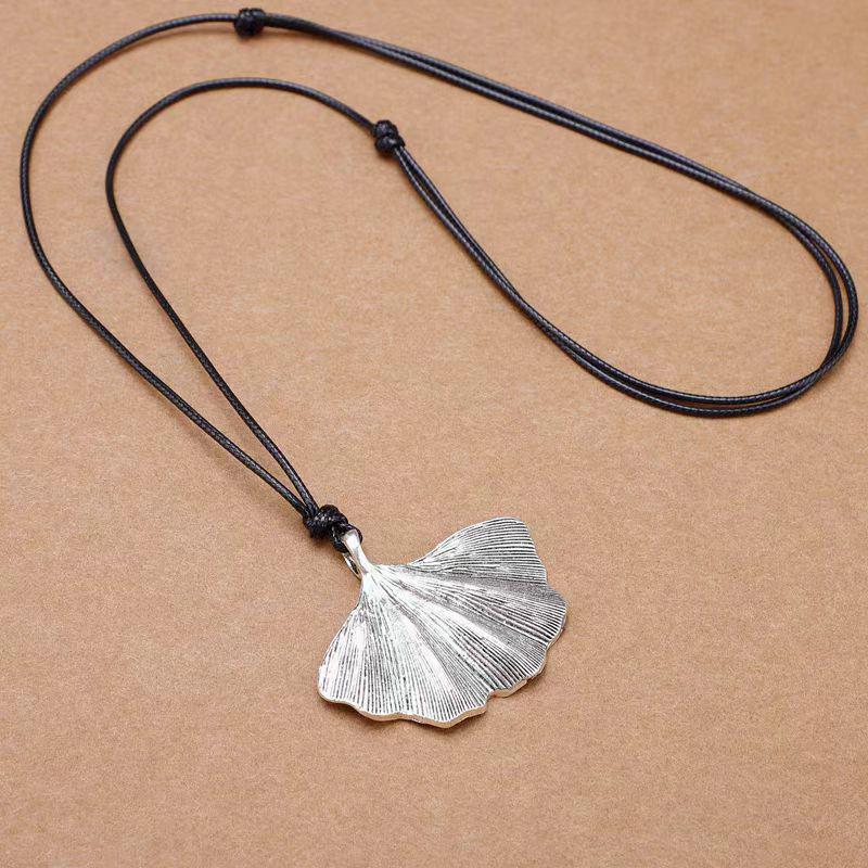 Retro Leather Rope Necklace with Wooden Alloy Pendant for Cotton and Linen Sweaters