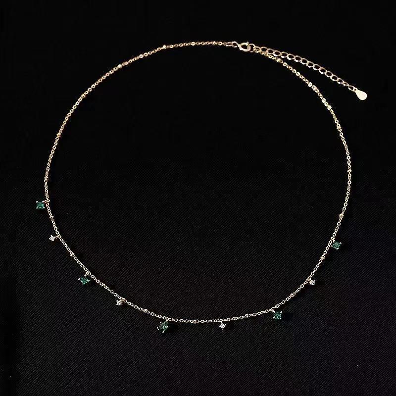 Elegant French Retro S925 Silver Necklace with Emerald Water Drop Zircon and Tassel Design