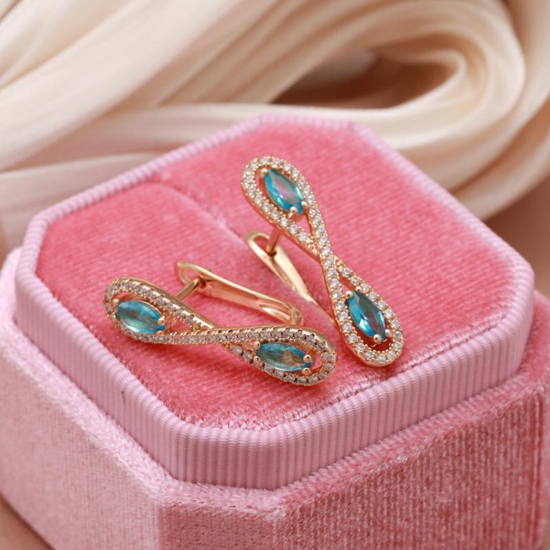Kinel Blue Zircon Symmetric Rose Gold Color Earrings