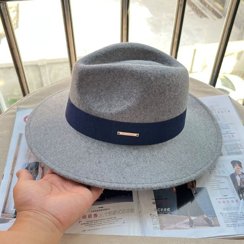 Export quality European, American French British autumn and winter flat edge woolen top hat men's and women's fashion wide-brimmed camel black versati