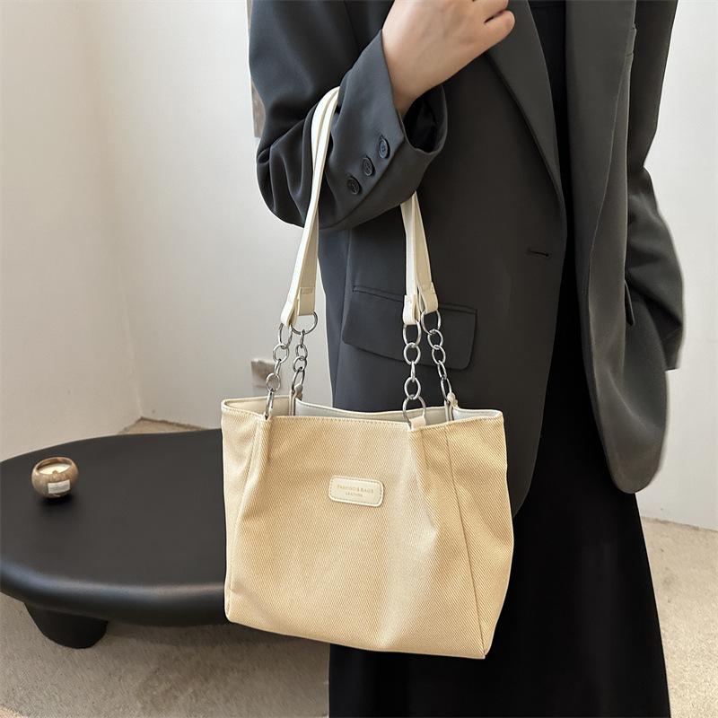 Simple and large-capacity tote bag, casual shoulder big bag, women's 2025 new college students' class commuting bag