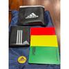 Used Soccer referee set: 2 watches, 3 whistles, green, yellow, and red cards with case, badge, etc.