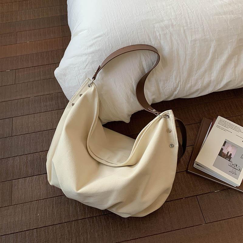 Casual commuting large-capacity canvas bag women's 2025 new lightweight and versatile messenger bag soft shoulder tote bag