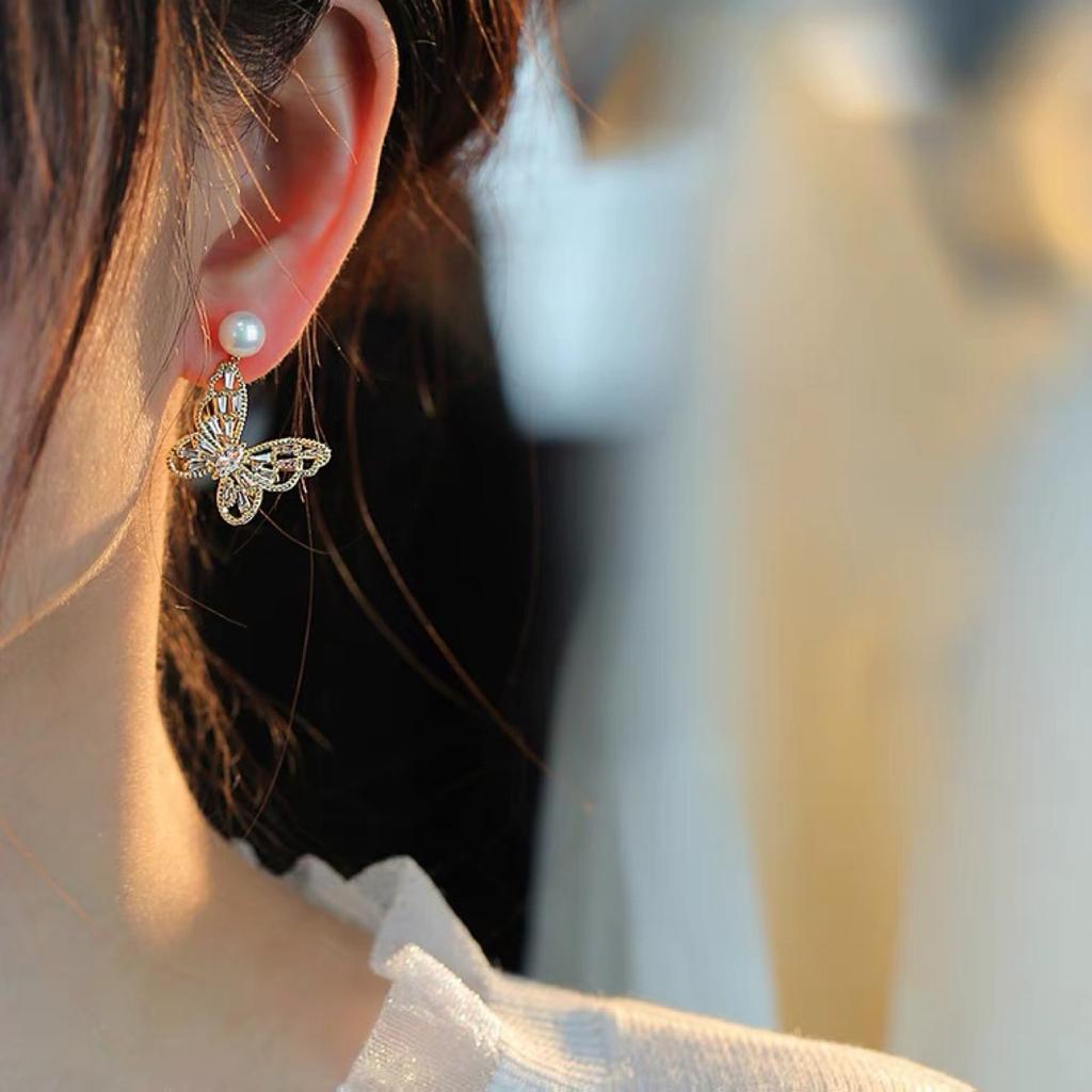 EH53-9 Hollow design butterfly earrings women's niche natural pearl stud earrings temperament versatile S925 silver needle