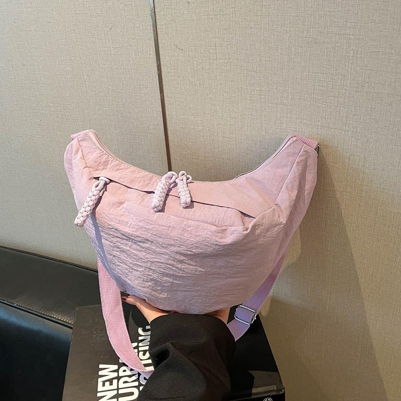 Korean version of high-value fashion solid color dumpling bag spring new simple shoulder bag casual nylon messenger bag