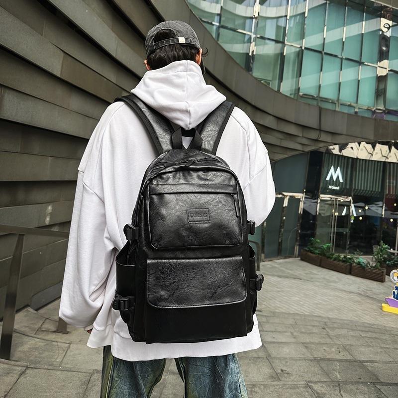 Korean version of PU men's backpack backpack travel bag student schoolbag computer men's bag tide
