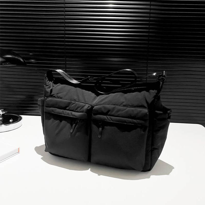 Unisex vodoodpudivá nylonová crossbody taška s více kapsami