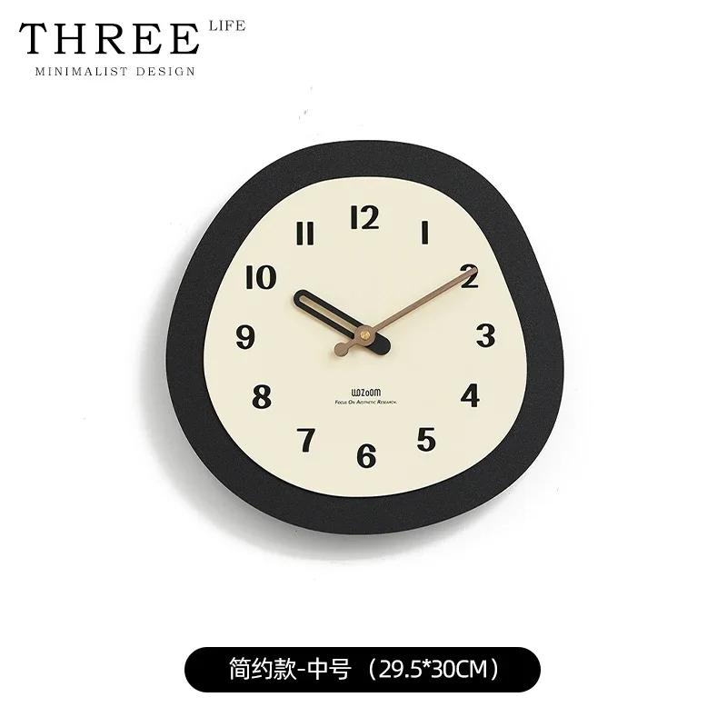 

Battery-powered simple and small clock. Unique aesthetic style. Minimalist wall clock decoration. Wall design. Fashionable wall