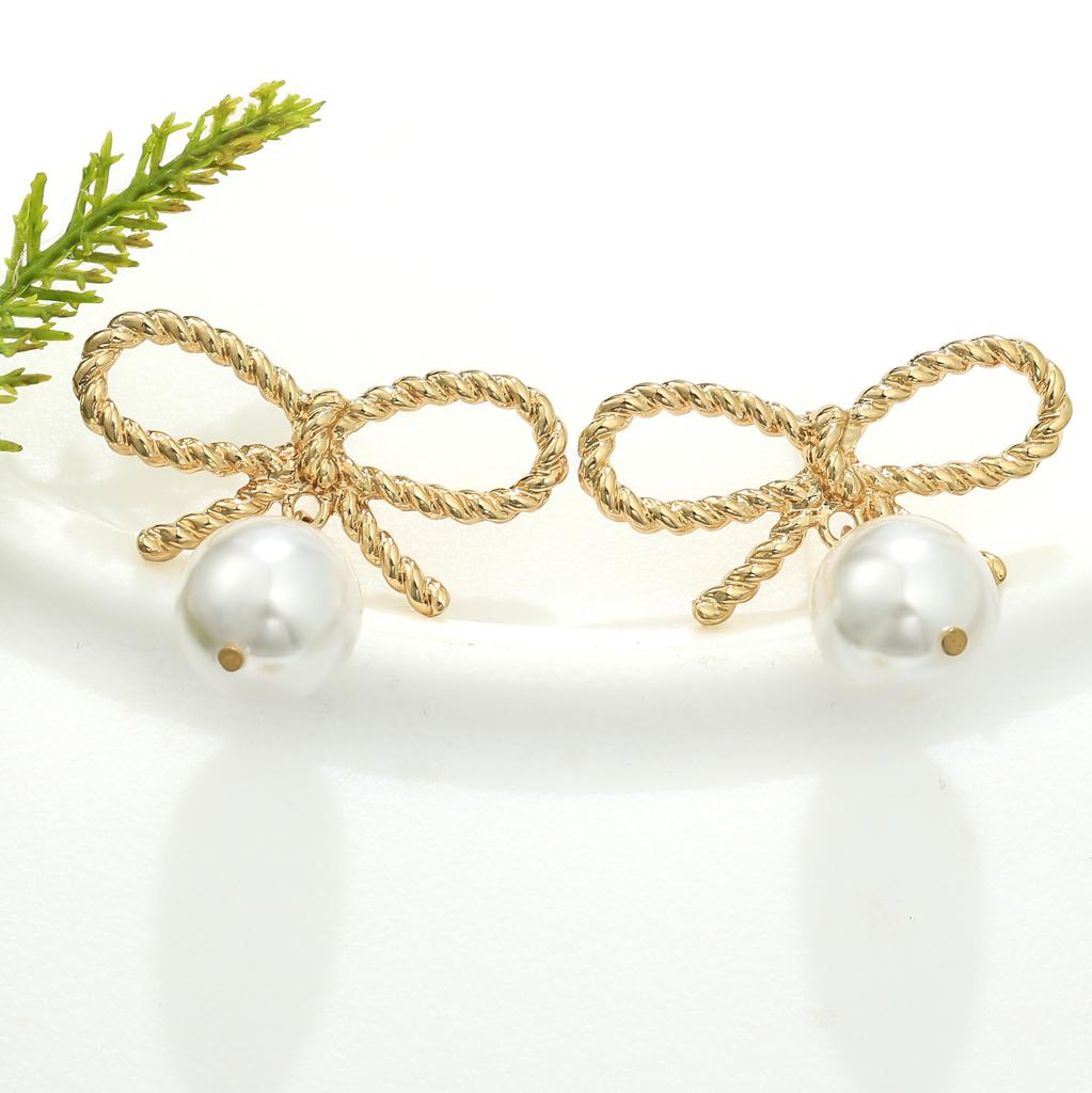 Retro Personality Hollow Bow Design Sense Imitation Pearl Stud Earrings Exaggerated Temperament Versatile Earrings