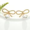 Retro Personality Hollow Bow Design Sense Imitation Pearl Stud Earrings Exaggerated Temperament Versatile Earrings