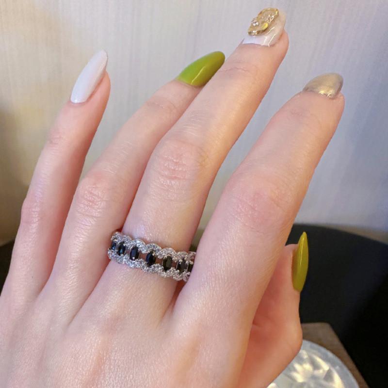 Olive Stunning Black Crystal Ring For Women Offering Adjustable Fit And Unique Geometric Design