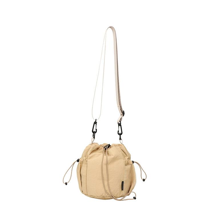 Japanese ins style niche design sense drawstring bucket outdoor sports leisure fashion versatile nylon messenger bag