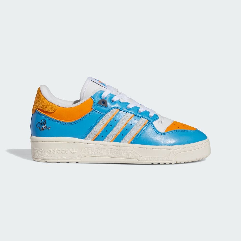 

Adidas THE SIMPSONS RIVALRY LOW ICHHY Поставщик Цвет Кроссовки ORIGINALS Унисекс IE7566 Поставщик Цвет / Halo Blue / Cream White