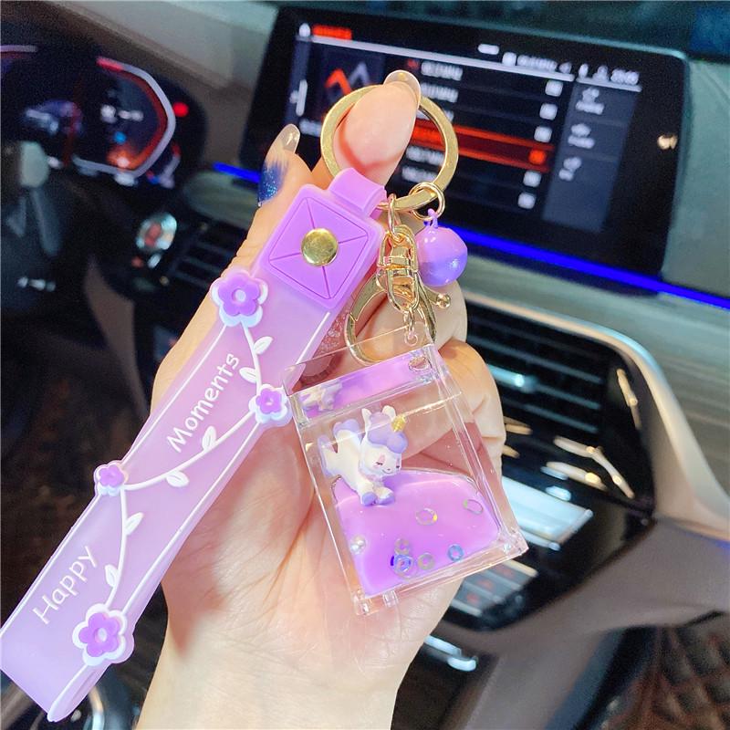 Lila Stern Flüssiger Treibsand Schlüsselanhänger mit Kirschblüten Öl-gefülltem Anhänger - Niedlicher 3D Rucksackanhänger für Frauen