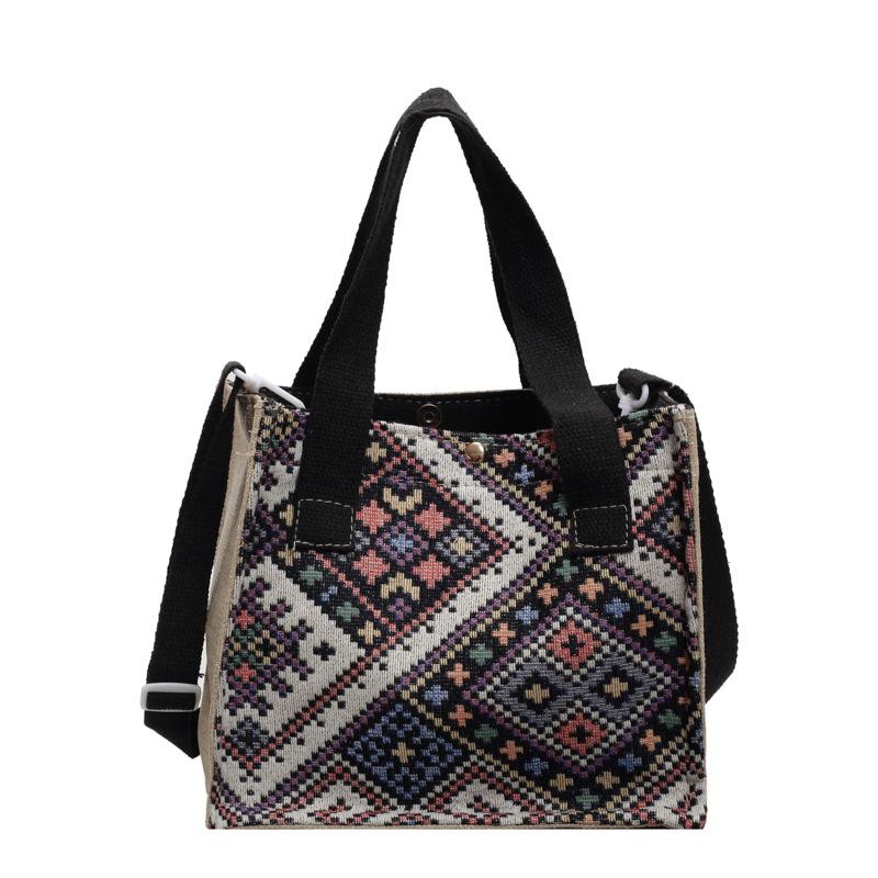 Hochwertige kleine Tasche im Ethno-Stil für Damen. Neue trendige Umhängetasche für Damen. Modische, vielseitige Schultertasche für Damen.