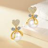 S925 Silver Needle Korean Fashion Versatile Micro-inlaid Zircon Peach Heart Bow Pearl Stud Earrings Femininity Elegant Earrings 2026