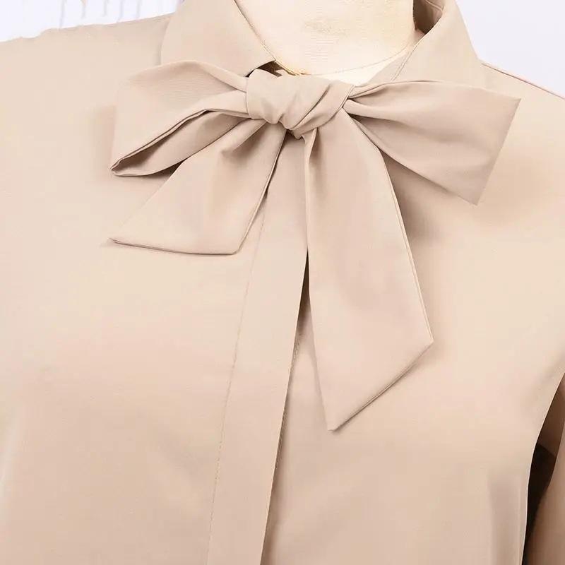 Muslimské dámské jednobarevné šaty košilového střihu s dlouhým rukávem, klopou s mašlí, kapsami a kardiganem