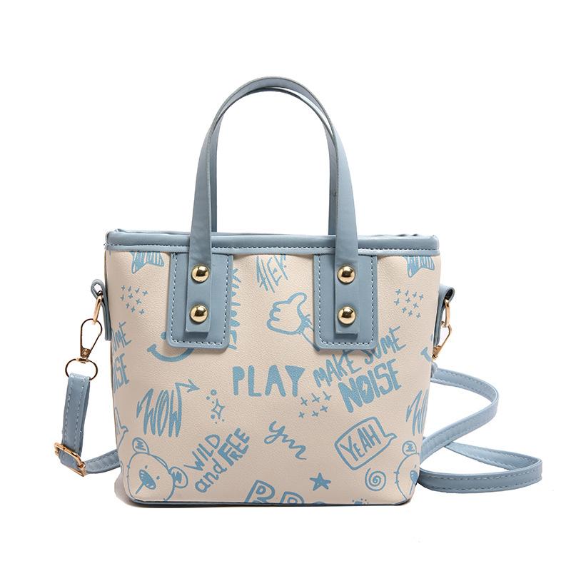 Contrasting color big bag women's 2025 autumn and winter new cute cartoon printed shoulder bag versatile trendy tote bag