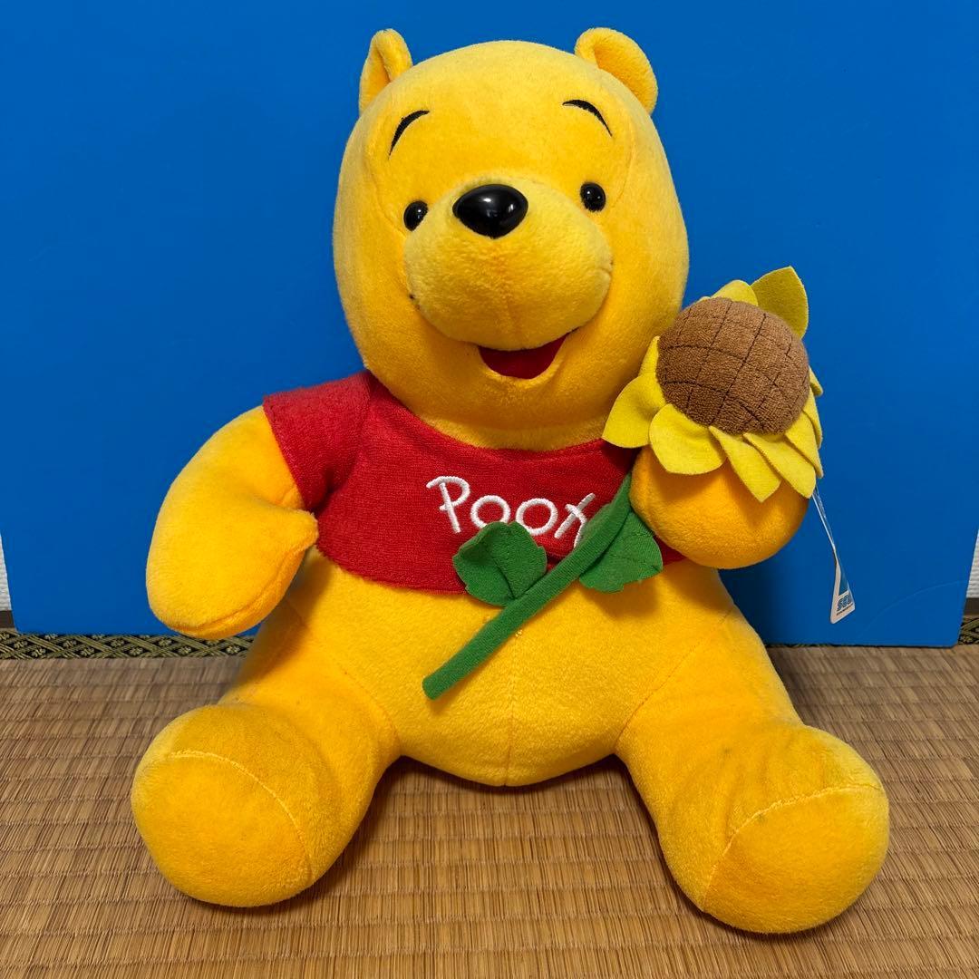 Winnie the Pooh stuffed toy with sunflowers approx. 30cm