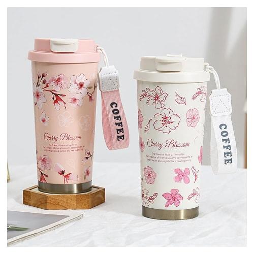 Cute floral-patterned thermos tumbler, vacuum insulated, stainless steel construction, leak-proof, and can be used with a straw or directly from the b