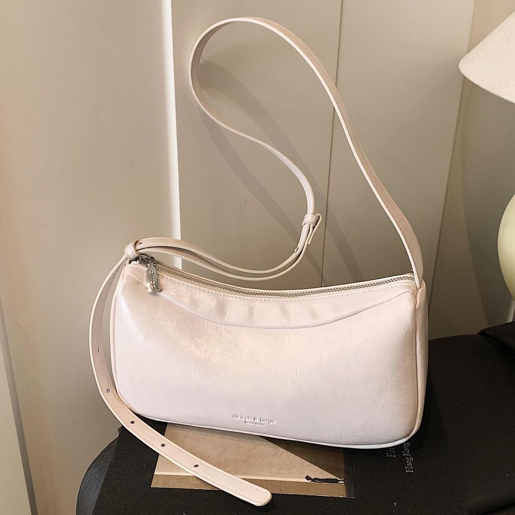 South Korea's Niche New Fashion Underarm Bag 2025 Spring Leather Simple and Versatile Commuter One-shoulder Cross-body Bag for Women