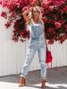 Tuta di jeans strappata da donna azzurro chiaro