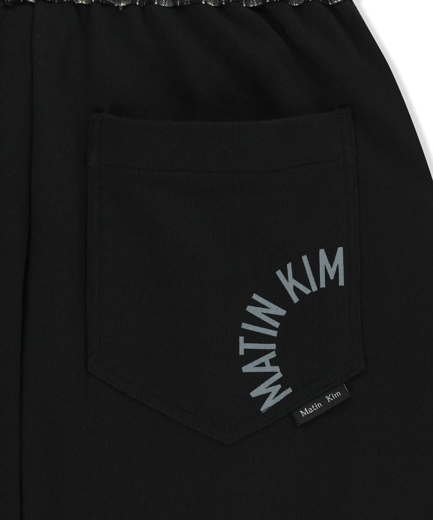 Matin Kim Check Mix Jersey Pants In Black