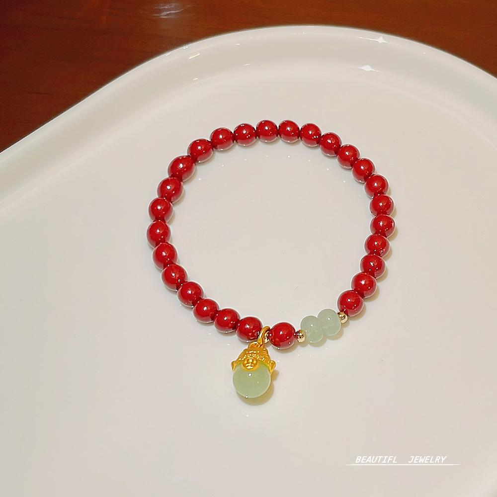 New design rock crystal elastic bracelet sweet temperament strawberry crystal bracelet jewelry girl.