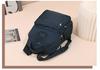 Large Capacity Unisex Splash-Proof Nylon Backpack: Travel, Casual, Fashionable, Suitcase Handle Compatible, School Bag
