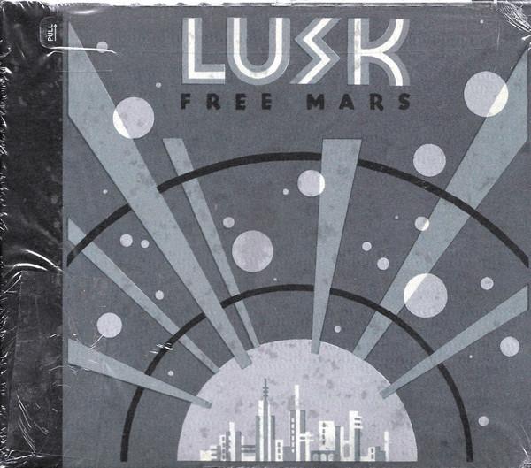 

CD LUSK - Free Mars 61422311412 Volcano, Zoo En 1997 US Rock Used
