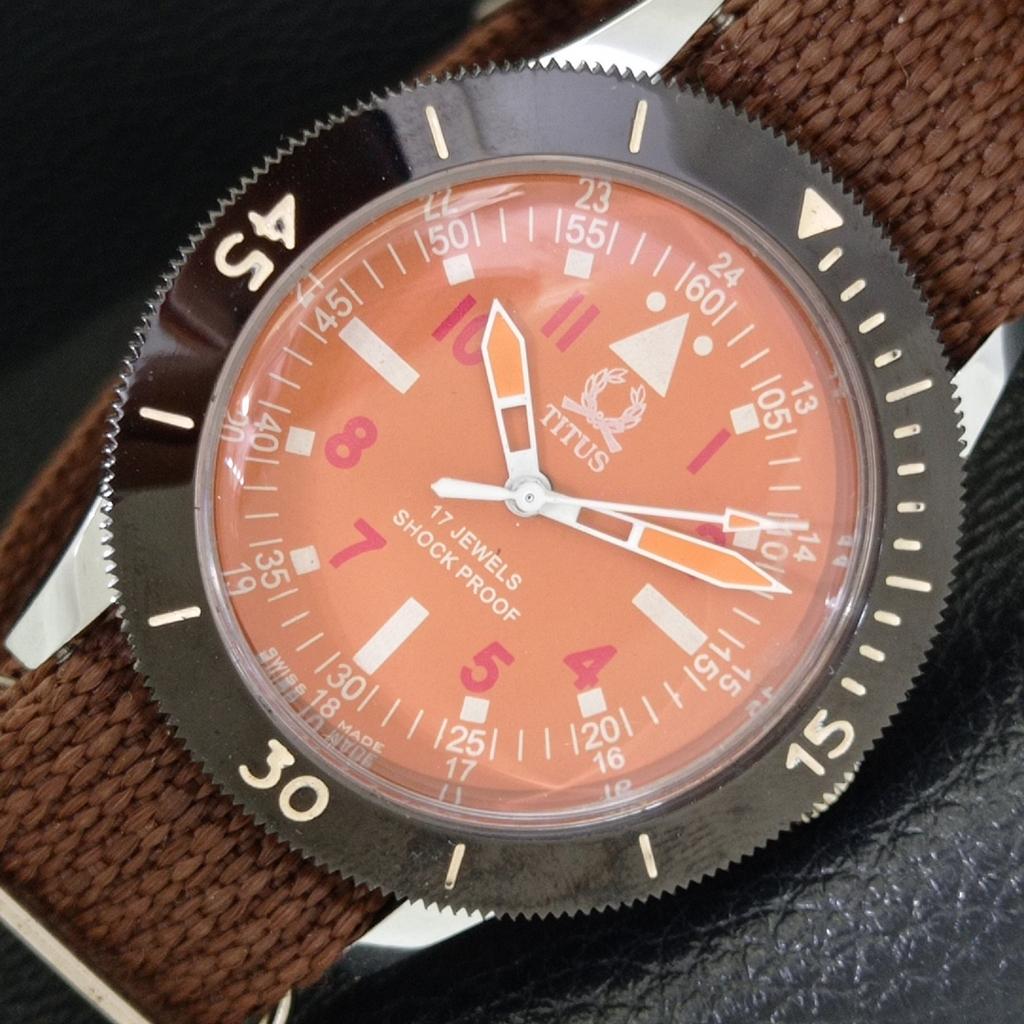

SWISS VINTAGE TITUS HAND-WINDING MENS TURNABLE BEZEL ORANGE DIAL WATCH a700013-5 R201-a700013