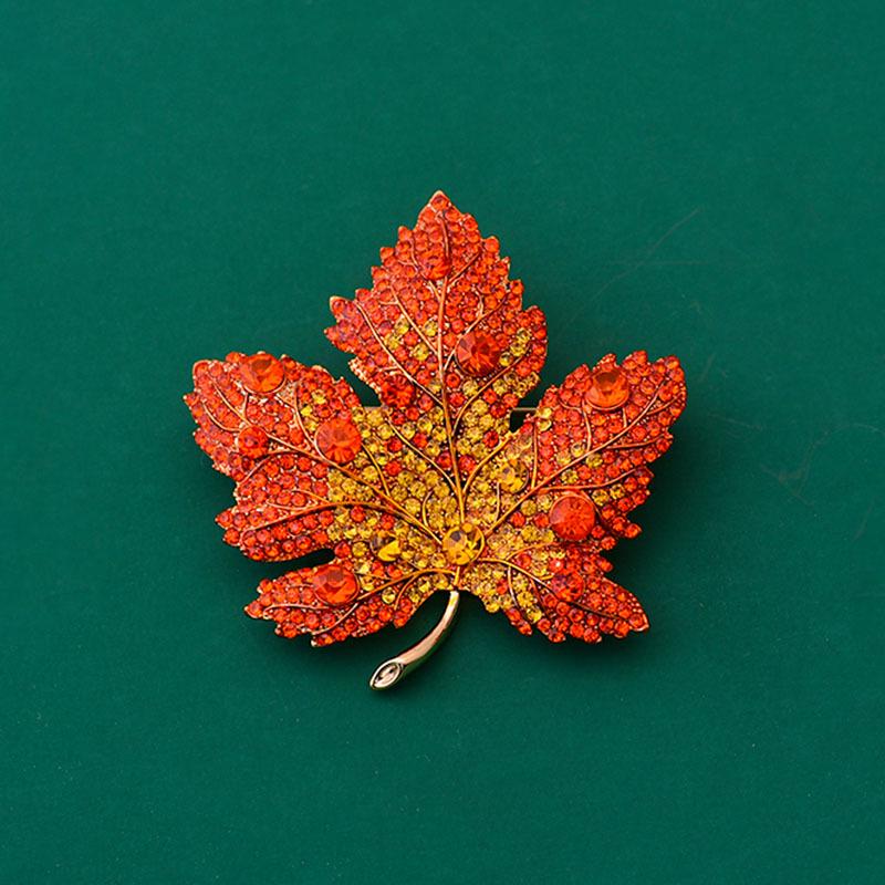 

High-End Maple Leaf Brooch: Elegant Women s Crystal Pin for Suits & Coats