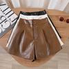 Damen Herbst Doppelte Knöpfe PU-Leder Shorts Locker Schlankmachend A-Linie Weites Bein Hoher Bund Außenbekleidung Lässige Hosen Mini Shorts