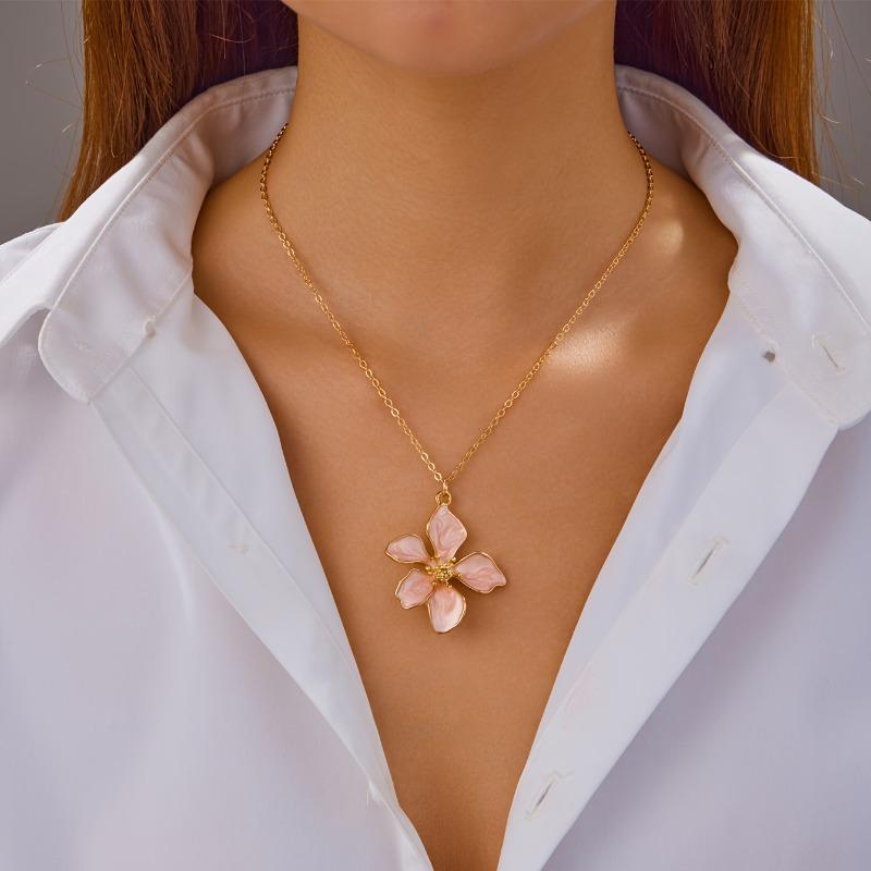 Fashion flower pendant necklace with white enamel petals. Elegant daily jewelry for casual, formal and vacation wear, perfect gift for women.
