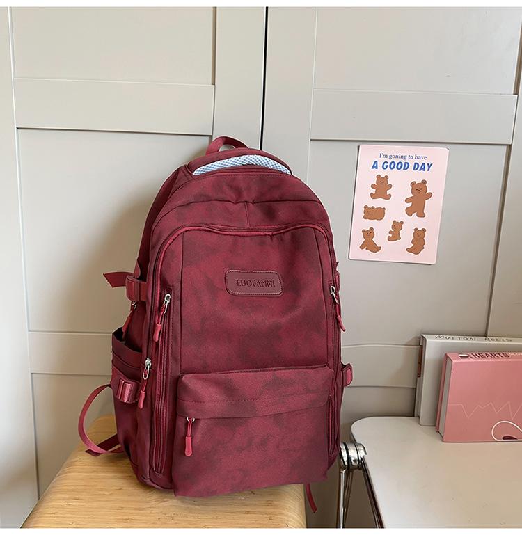 School bag Female and male primary school students Large capacity backpack Junior high school students High school students Lightweight
