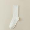 For Women, There Are Boneless and Non-uncomfortable Mid-calf Socks. Pull A Solid-colored Cotton Long Calf Sock That Is Breathable