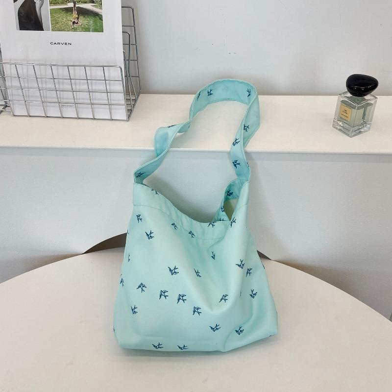 

4 Niche printed canvas bag New large-capacity shoulder bag Commuter tote bag Shopping bag