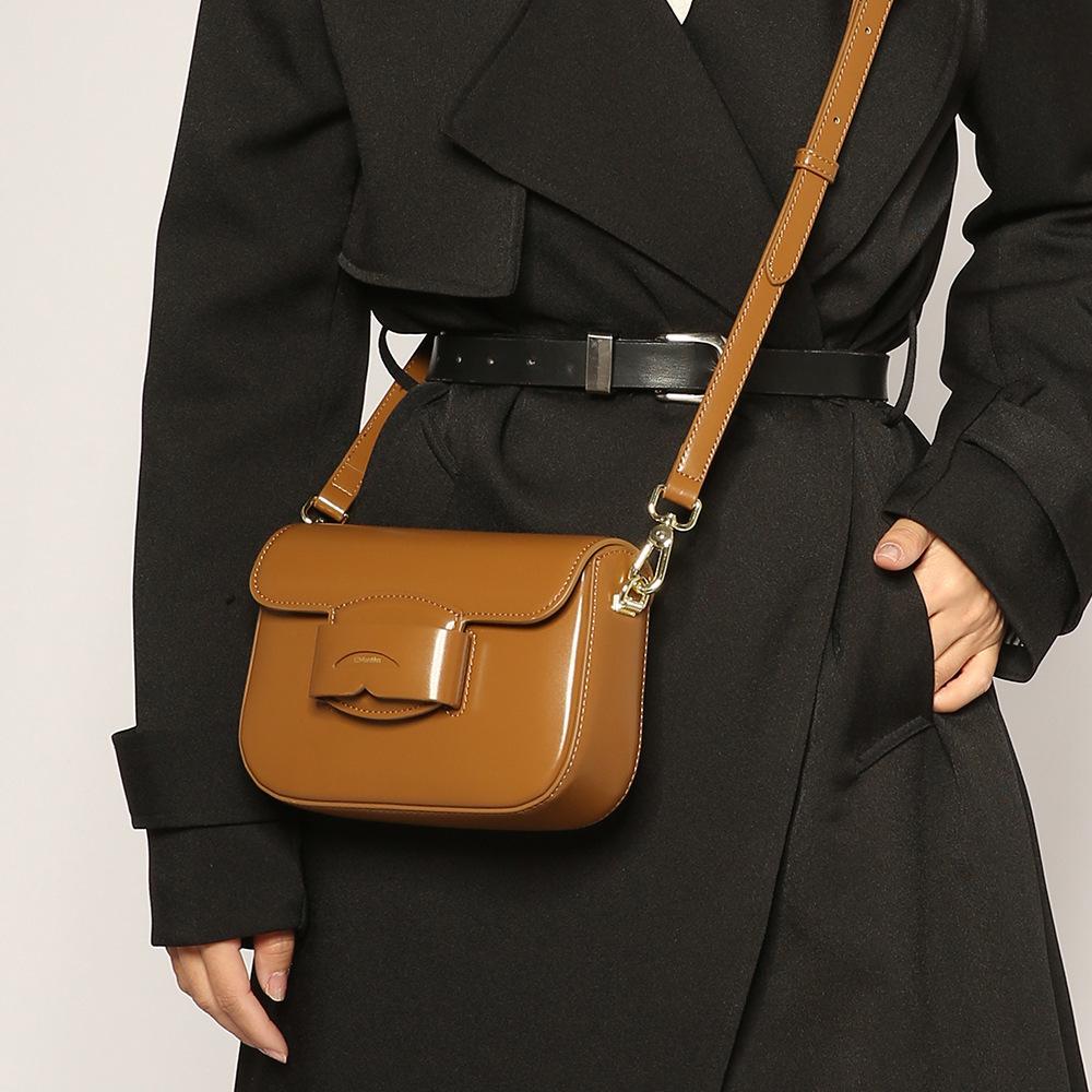 Niche design bag spring women's versatile fashion high-end exquisite messenger bag saddle tofu small square bag
