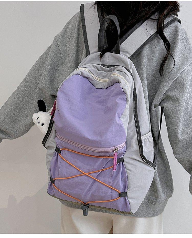 Schoolbag travel easily, a backpack, full of trendy fashion nylon zipper contrasting colors