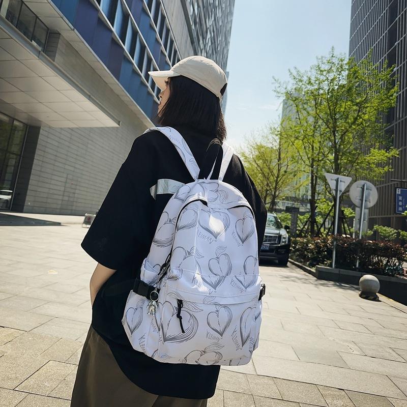 Schoolbag trendy brand original heart-shaped printed schoolbag women's large-capacity travel class backpack light and versatile trendy cool backpack