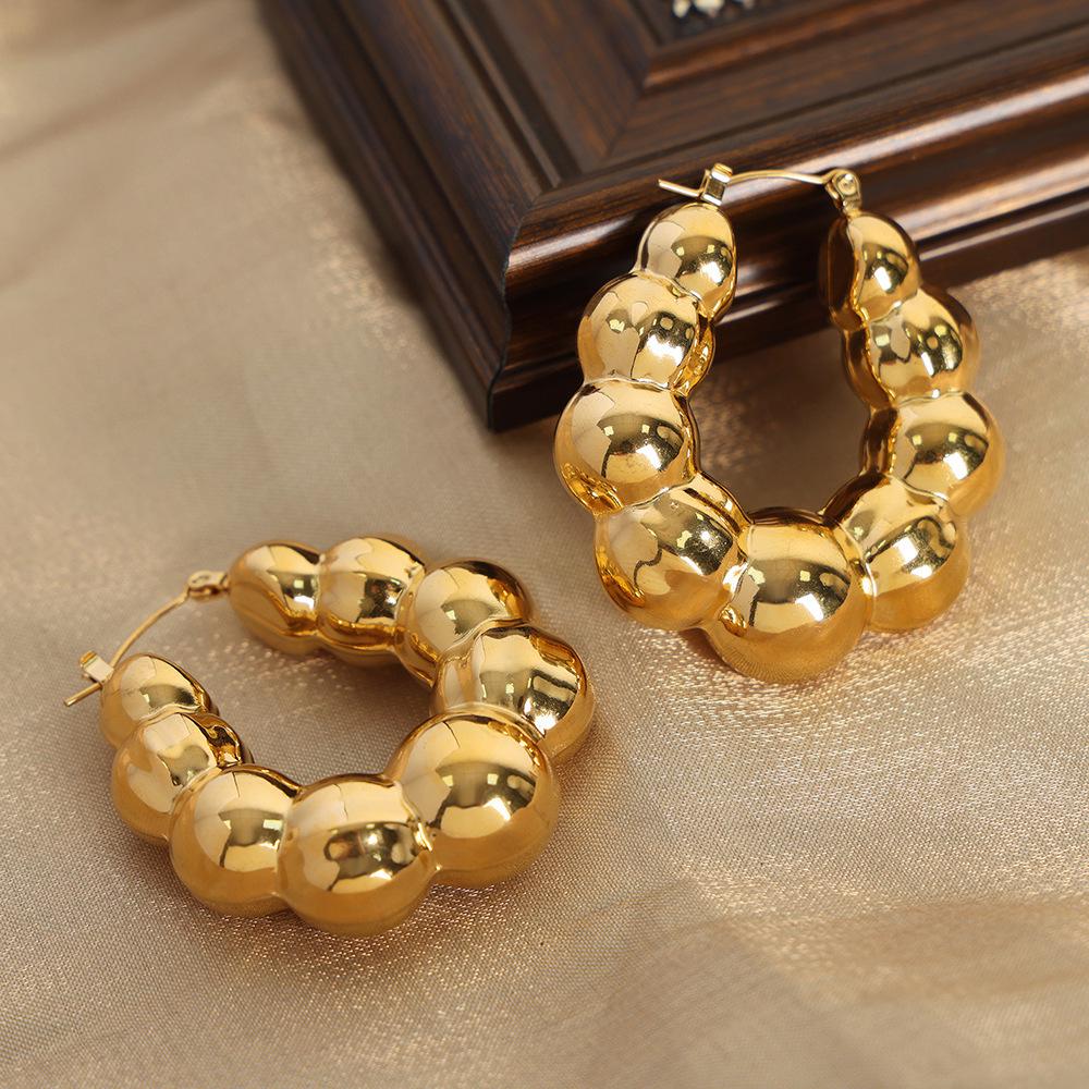 Textured Gold-Plated Titanium Steel U-Shaped Earrings with Steel Ball Design