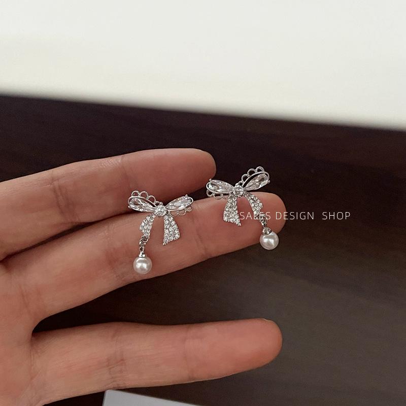 Korean Zircon Bow Pearl Stud Earrings - High-End, Versatile & Elegant.